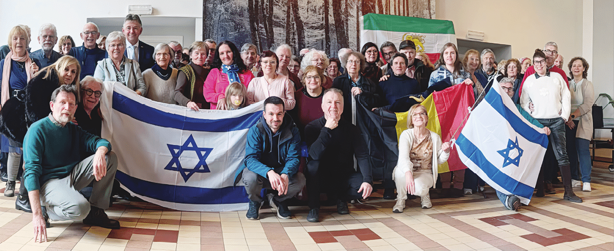 A group of people holding flags from different countries. Description generated by AI