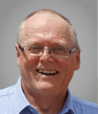 A man wearing glasses and a blue shirt. Description generated by AI