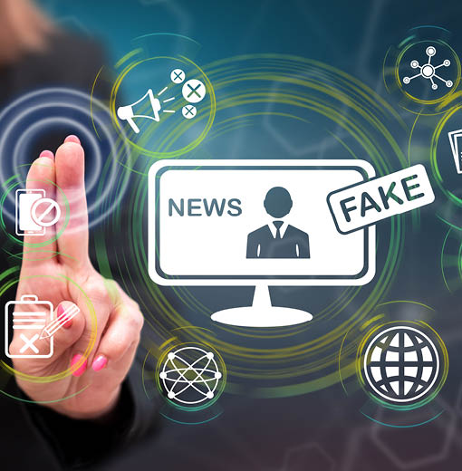 Woman touching a fake news concept on a touch screen with her fingers