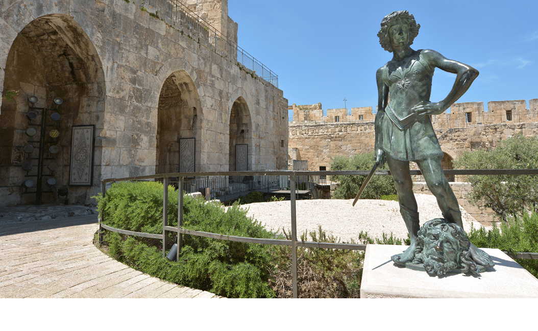 JERUSALEM - MAY 05 2015:David and Goliath sculpture at the Tower of David and archeological garden in Jerusalem, Israel It's a famous landmark of Jerusalem with historical significant 