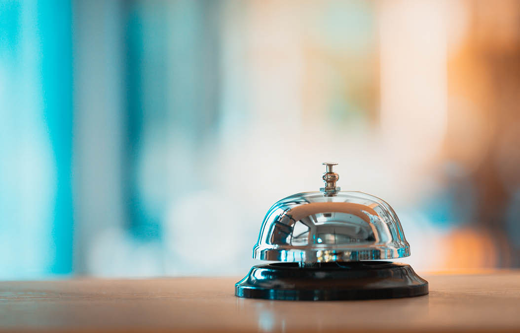 Bell on counter for service with blurred background