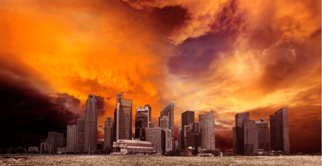 City overlooking desolate desert landscape with cracked earth