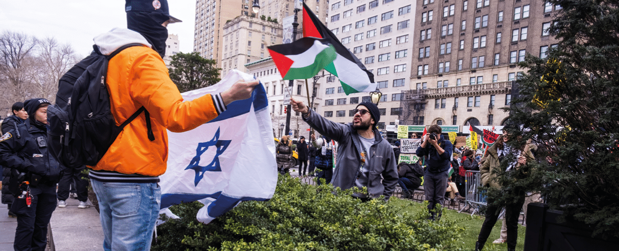 New York, NY, USA December 23 2023: Pro-Palestine Protesters gather in front of the Plaza Hotel. Pro Israel group is present in counter protest.